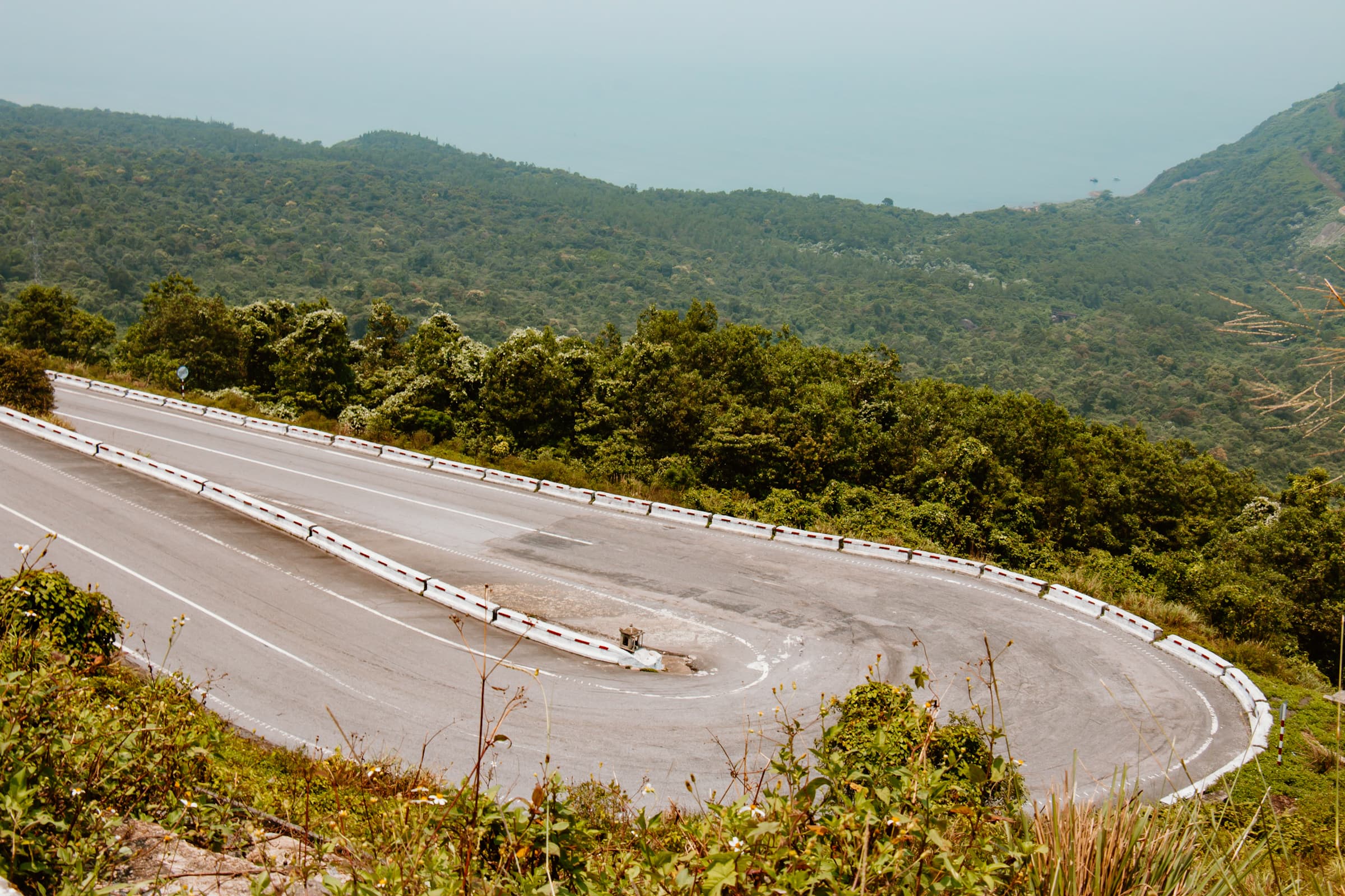Hai Van pass Vietnam road bend hairpin mountain curve