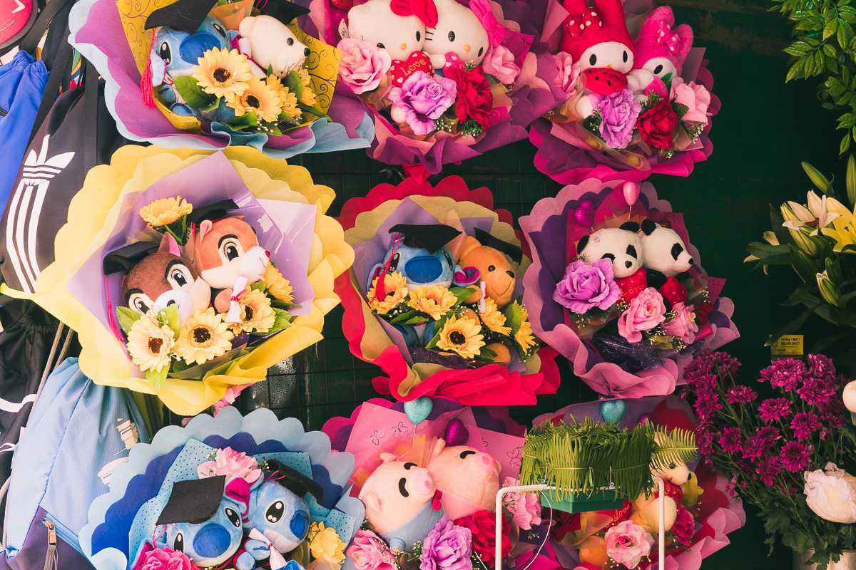 bouquets of flowers and cuddly toys in chinatown