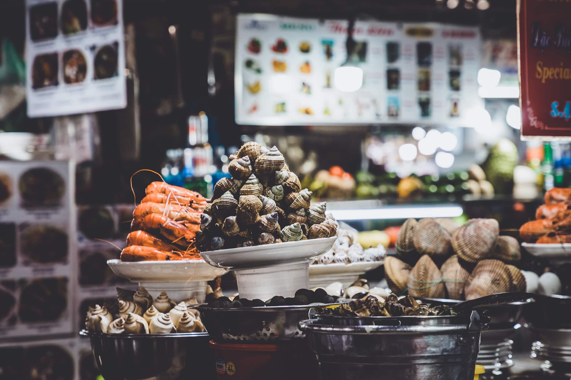 Snails, crayfish and seafood at Ben Thanh Market, a tourist attraction in Saigon