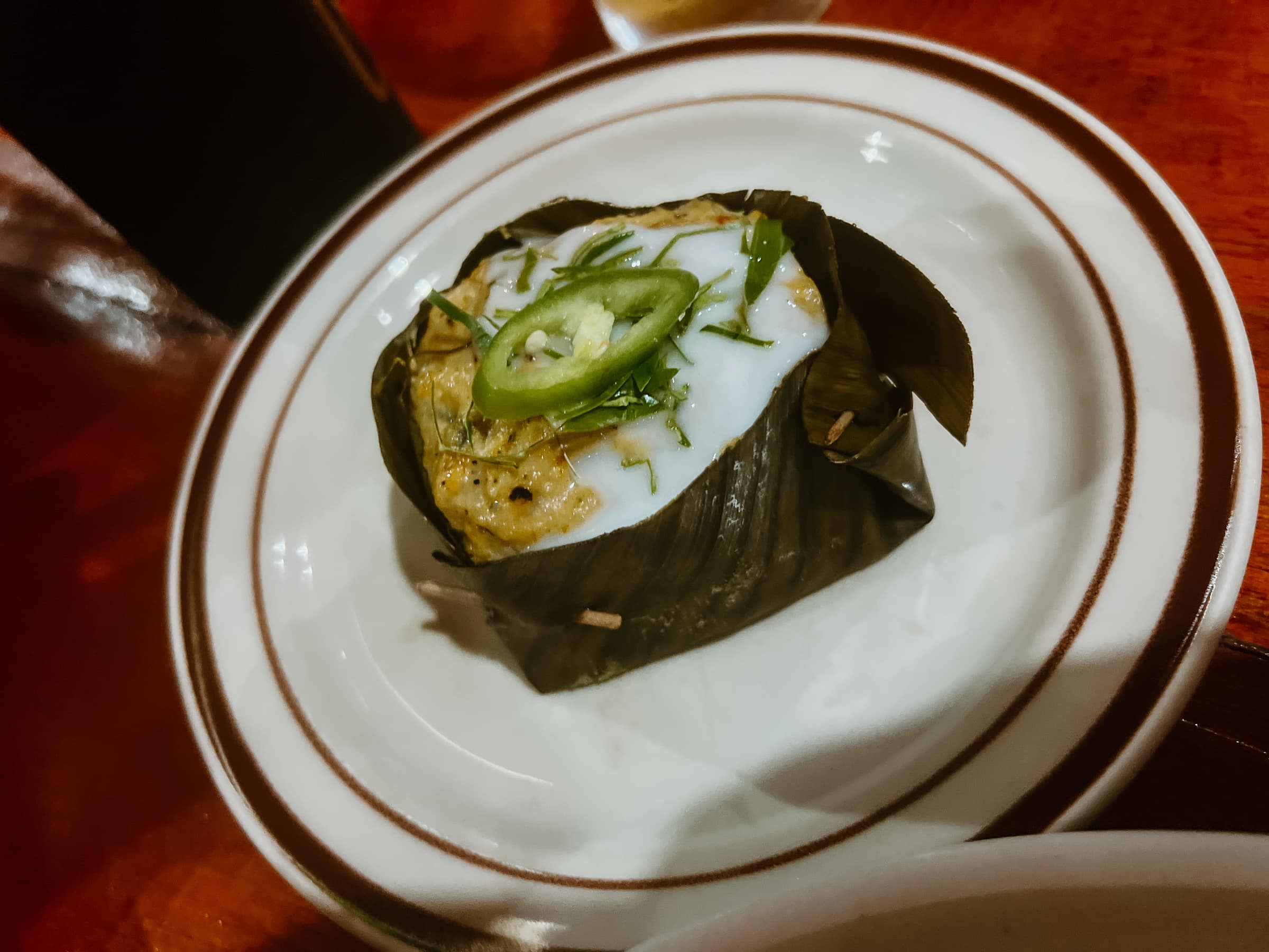 Hor Mok, a fish curry patty wrapped in banana leaves.