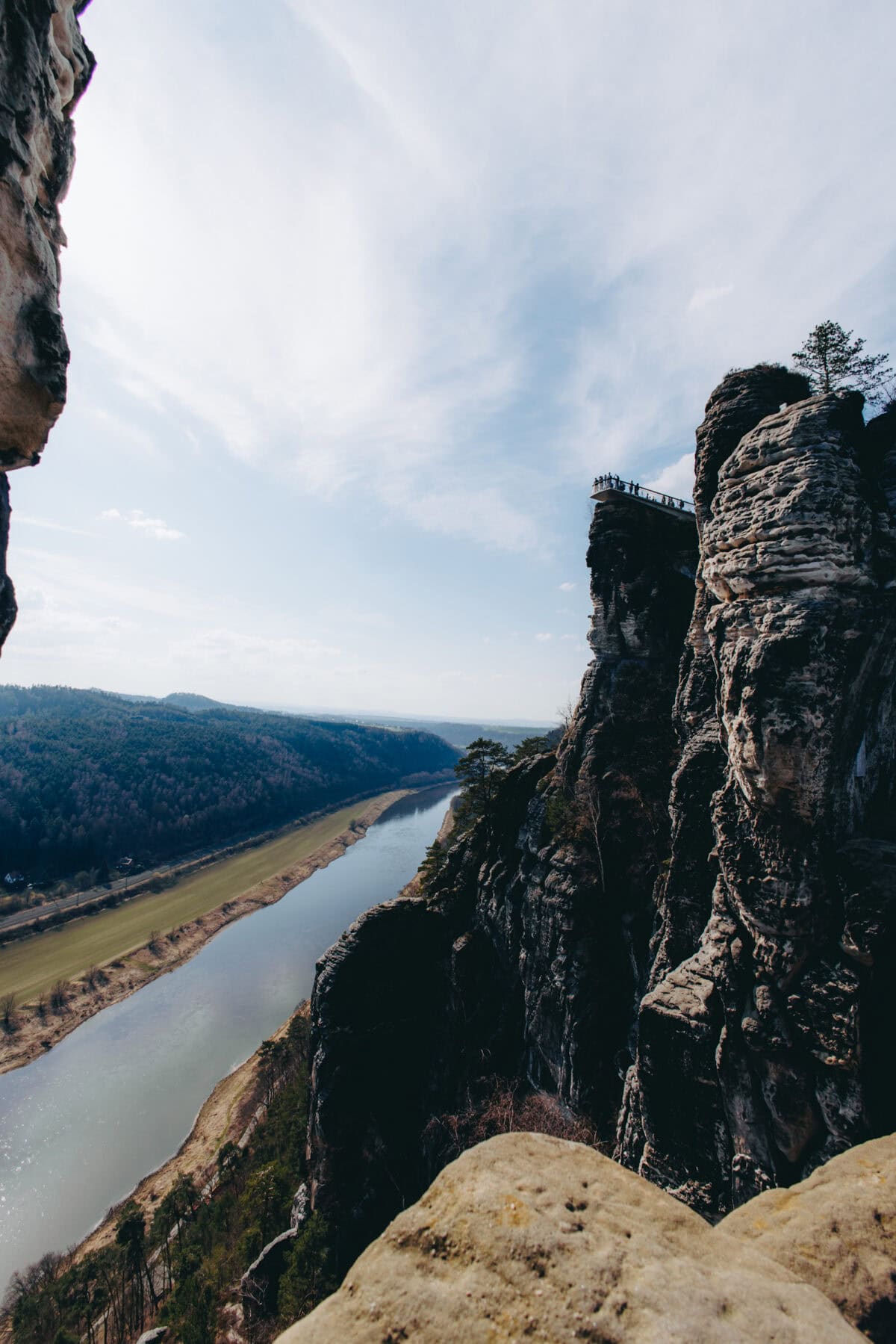 Rocky cliffs with viewing platform over river valley